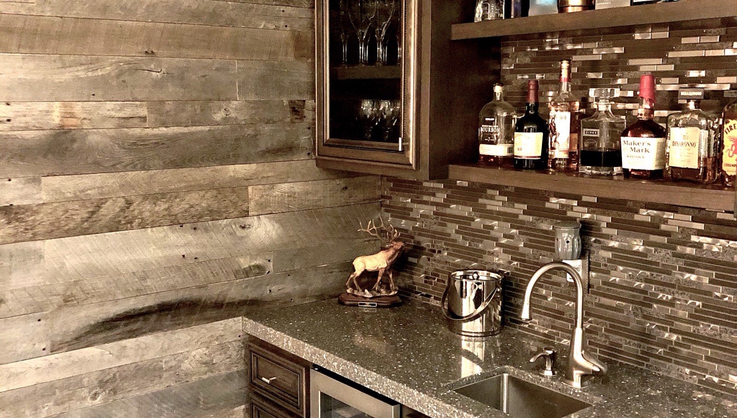 Custom bar with tile backsplash, granite countertop, and fine cabinetry by Stiltz Tile & Granite